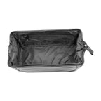 Interior view of a VILL OKSE leather toiletry bag with zipper bottom featuring spacious storage